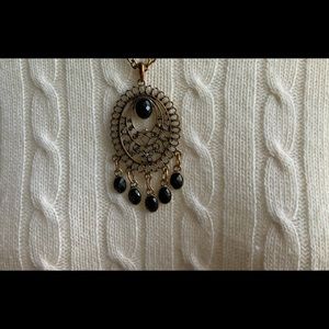 Gold and black necklace